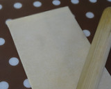 A picture of step 11 of Refreshing Orange Icebox Cookies.