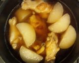 A picture of step 11 of Frozen Daikon Radish and Chicken Wings Simmered In Mentsuyu.