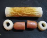 A picture of step 1 of For Character Bentos! Chikuwa and Wiener Sausage Acorns.