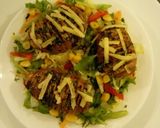 A picture of step 3 of Hasselback Potatoes Served with garden fresh salad.
