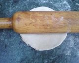 A picture of step 7 of Aalu Paranttha (potato stuff brush fried bread).