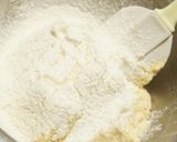 A picture of step 3 of Easy and Fluffy Vanilla and Chocolate Muffins.