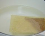 A picture of step 2 of Fragrant With Mitsuba and Yuzu! Ozouni (Mochi Rice Cake Soup for New Years).