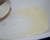 A picture of step 6 of Coloured tahdig.