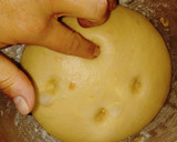 Foto del paso 10 de la receta: Pan dulce esponjoso con chips de chocolate, nueces y almendras