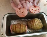 A picture of step 4 of Hasselback Potatoes.