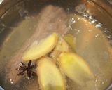 A picture of step 2 of Suan Ni Bai Rou (Boiled Sliced Pork with Garlic Sauce).
