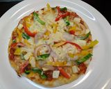 A picture of step 7 of Pizza without ovenstory.