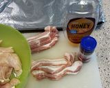 A picture of step 1 of Honey chicken wrapped in bacon.