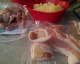 A picture of step 2 of sunshine's.bacon wrapped pineapple and li'l smokies.