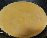 Foto del paso 1 de la receta: Rollo de tortilla con jamón y queso