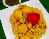 A picture of step 11 of Aloo ki taheri.