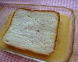 A picture of step 4 of Sweet Joy! French Toast Jam Sandwich.