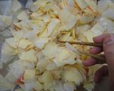 A picture of step 5 of Sweet and Sour Apple and Daikon Radish Namasu.