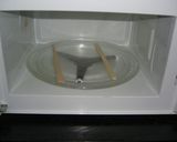 A picture of step 6 of Sesame and Kinako Marbled Japanese Flavored Steamed Bread Made in a Microwave.