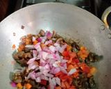 A picture of step 2 of Stir fried potatoes with veggies and gizzard.