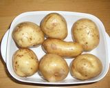 A picture of step 1 of Baked Potatoes with your Microwave and Toaster Oven.