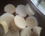 A picture of step 1 of Fried yam coated with egg and spicy fry sauce.
