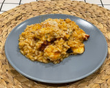 Foto del paso 8 de la receta: Arroz meloso de pulpo “a feira”, langostinos y queso