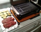 A picture of step 2 of Electric smokeless grill.