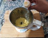 A picture of step 5 of Virgin Yakult Pina Colada topped with Whipped Cream.