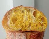 Foto langkah ke 30 dari resep Kunyit Swirl Sourdough Bread.