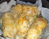 Foto del paso 5 de la receta: Rollitos de Pechuga de Pollo Rellenos de Jamón y Queso con Patatas a la Nata