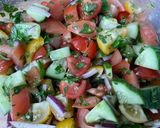 A picture of step 2 of Tomato, cucumber and avocado salad.