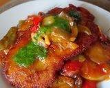 Foto del paso 7 de la receta: Pollo milanesa con tumbet