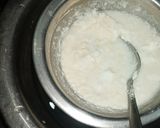 A picture of step 1 of Make curd hot in winter season by double boiling method example dahi vada.