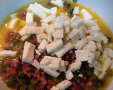 Foto del paso 7 de la receta: Tortilla de espárragos, jamón y queso fresco