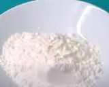 A picture of step 5 of Crinkle Coconut Cookies.