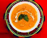 A picture of step 3 of Butter chicken 🐓 with garlic naan.