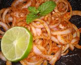 A picture of step 6 of Laccha Onion Salad.