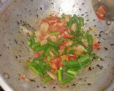Foto langkah ke 10 dari resep Tumis Bunga Daun Bawang.