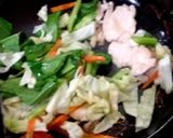 A picture of step 2 of Pad See Ew with Chicken and Thin Rice Noodles.