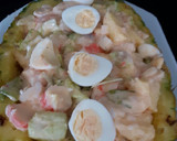 Foto del paso 3 de la receta: Cóctel de piña rellena con rape y gambas