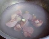 A picture of step 1 of Chicken soup with chicken sticks.