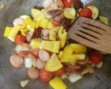 A picture of step 8 of My Quick smoked Sausage & Veg in a BBQ sauce.💚.