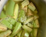A picture of step 4 of Kerala Style Baingan Dal Curry.