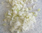 Foto del paso 3 de la receta: Guisantes con jamón y langostinos