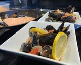 Une image de l'étape 6 de Moules fumées sauce tomate et crème.