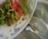 A picture of step 2 of Knorr Spicy and Tangy Soup Instant Noodles.