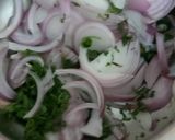 A picture of step 1 of Onion Pakodas.