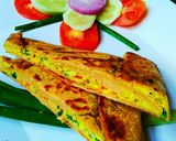 A picture of step 13 of Muglai egg paratha.
