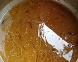 A picture of step 4 of Kaleji Masala with Naan.