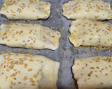 Foto del paso 4 de la receta: Cañas de hojaldre con champiñones, jamón york, queso y virutas de jamón serrano