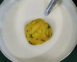 A picture of step 7 of Dosa bonda.