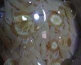 A picture of step 3 of Red sauce pasta with water.