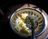 A picture of step 3 of Cheesy kulcha on tawa.